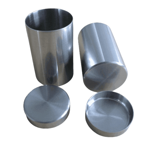 Nickel crucible vessels with matching lids shown beside the containers