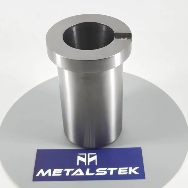 Open cylindrical tantalum crucible photographed with MetalsTek branding